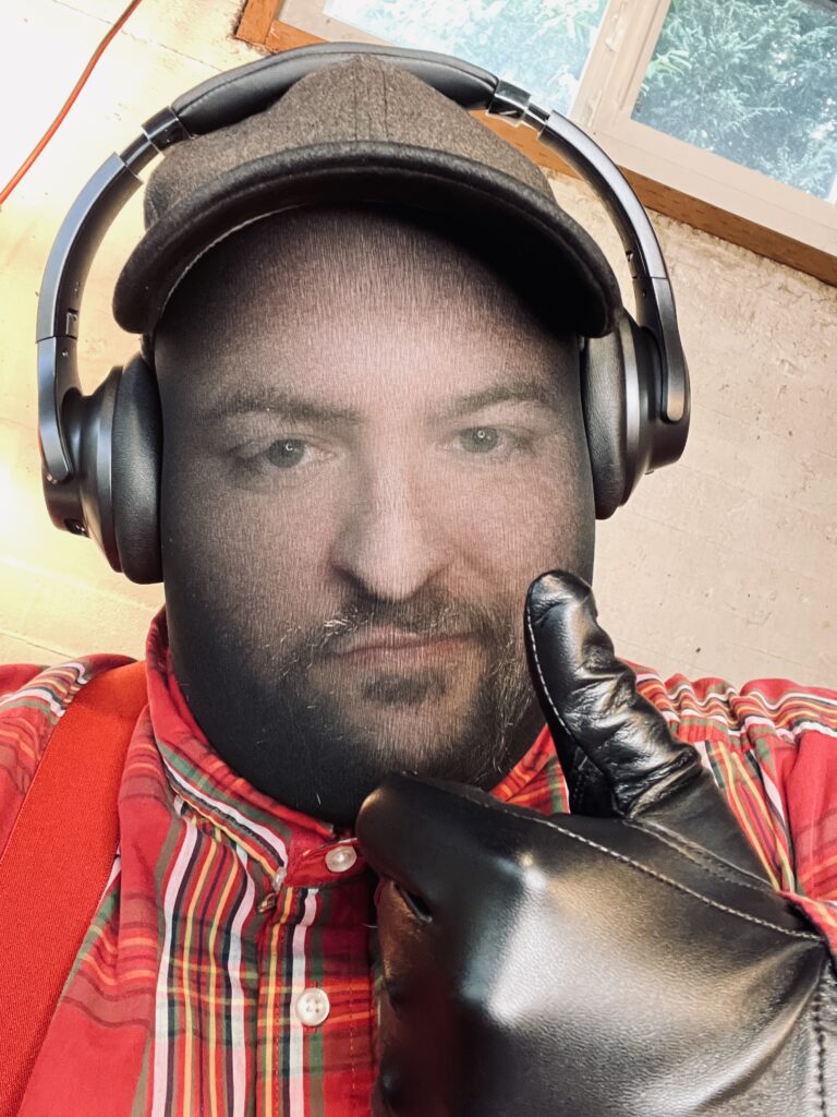 Jay Hypno giving a gloved thumbs up to the camera.